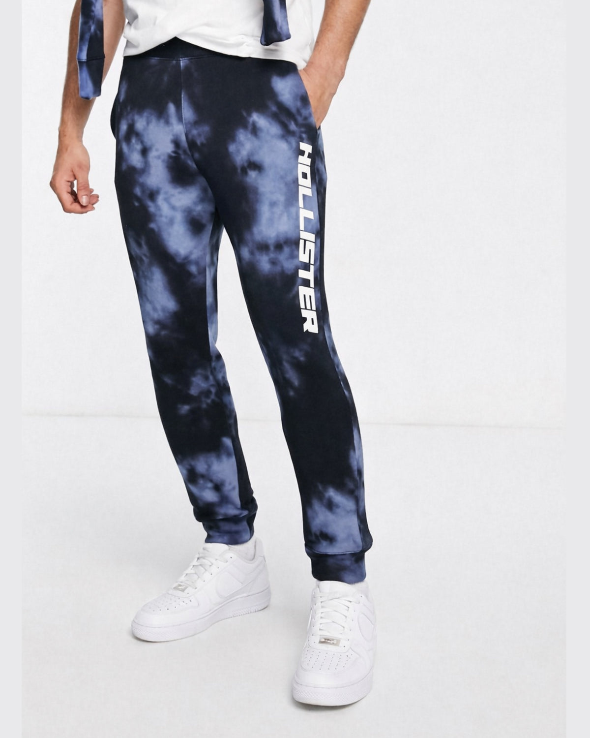 Hollister side logo acid wash cuffed sweat joggers in navy