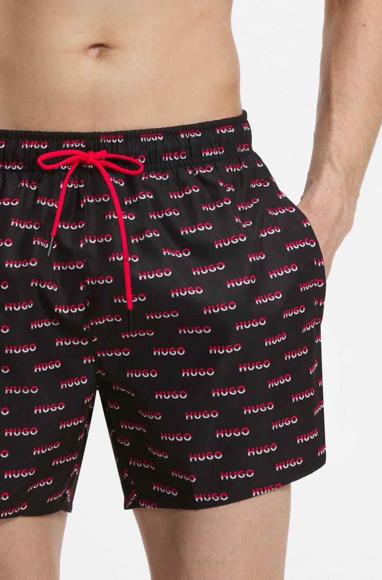 HUGO SWIM SHORTS WITH ALL-OVER SPLIT-LOGO PRINT