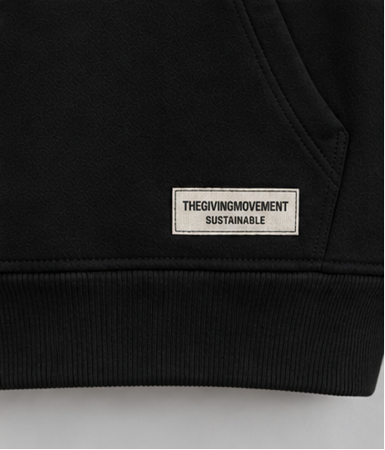 The Giving Movement zip-up hoodie